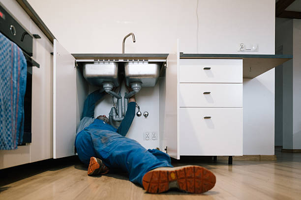 Professional Drain Cleaning technician working in Auburn, MI